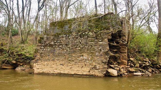 Crumbing stone bridge on the banks of the middle Oconee river