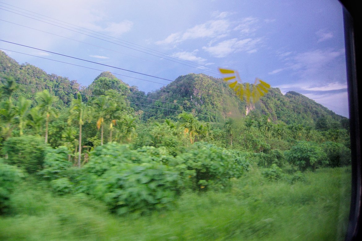 scenery from the train window, near Trang Thailand photographed by luxagraf