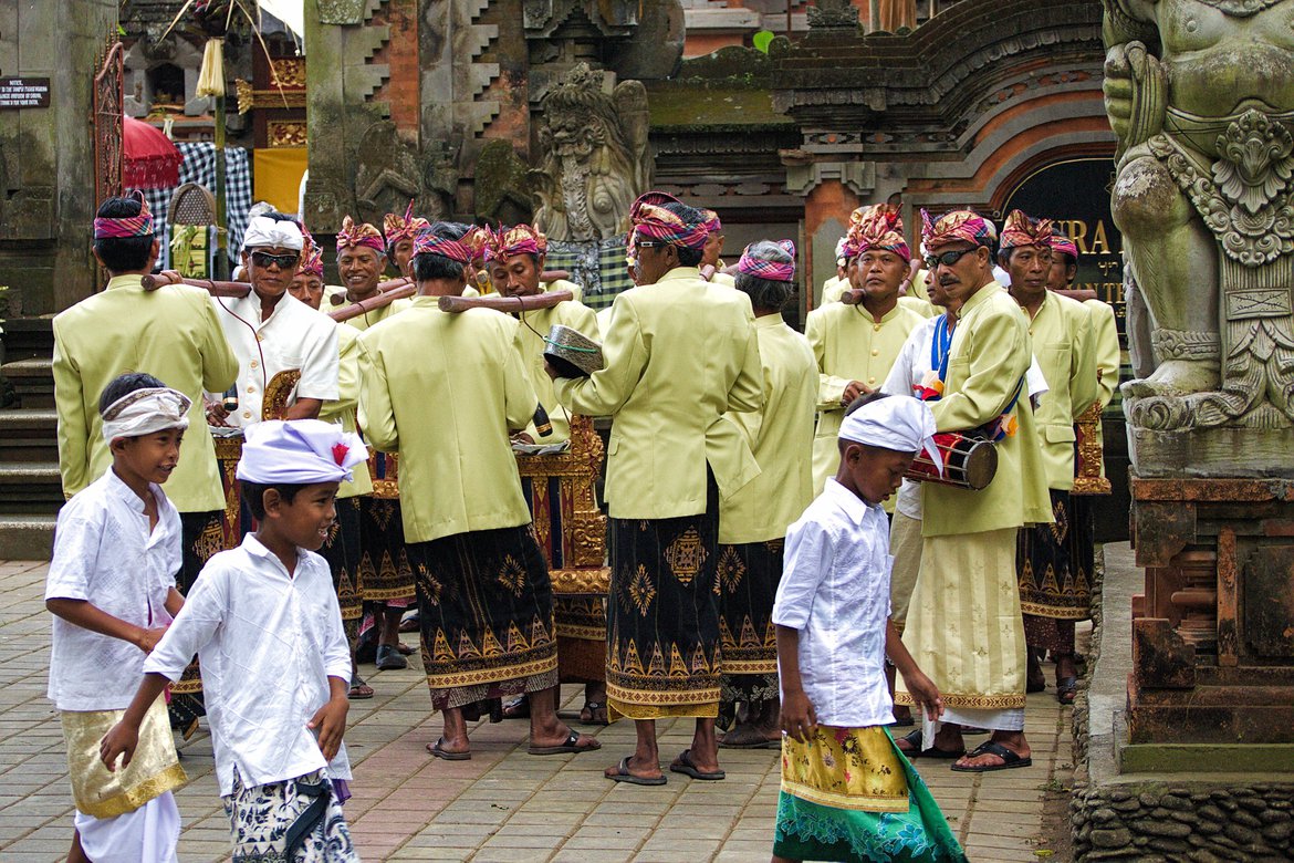 men waiting for temple ceremony to begin, ubud, bali Pomp and circumstance and nose picking. photographed by luxagraf