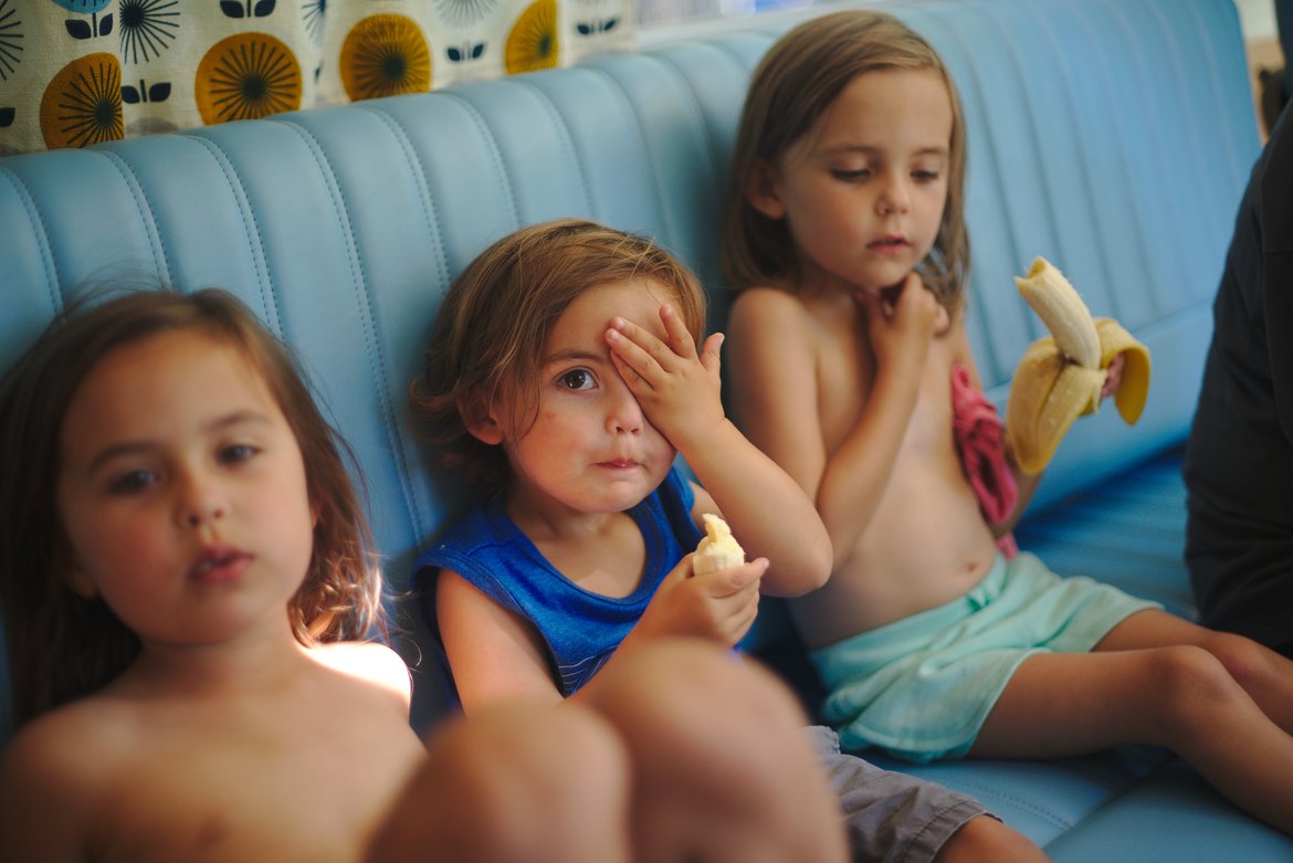 eating bananas in the bus photographed by Scott Gilbertson