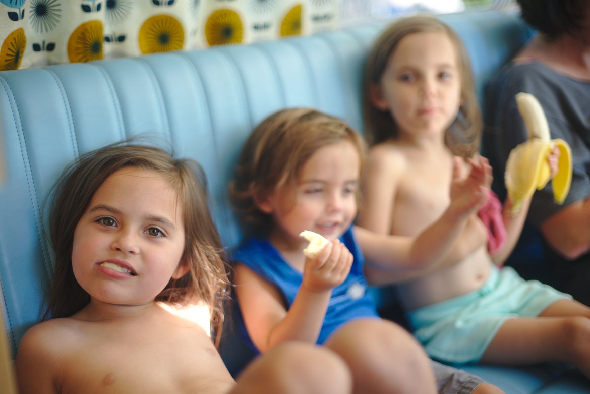 eating bananas in the bus photographed by Scott Gilbertson