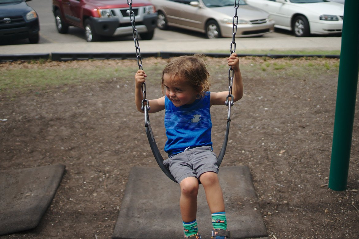 Swings in City Park, New Orleans photographed by luxagraf