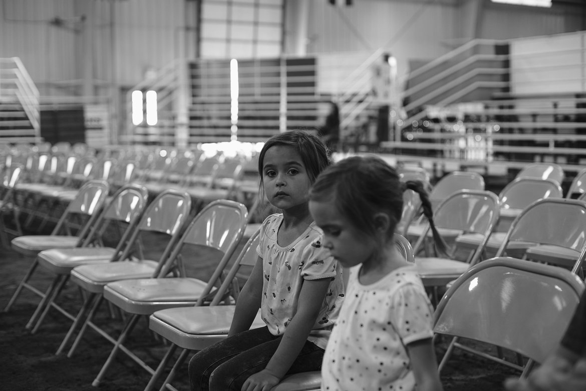 waiting on the corn shucking contest photographed by luxagraf