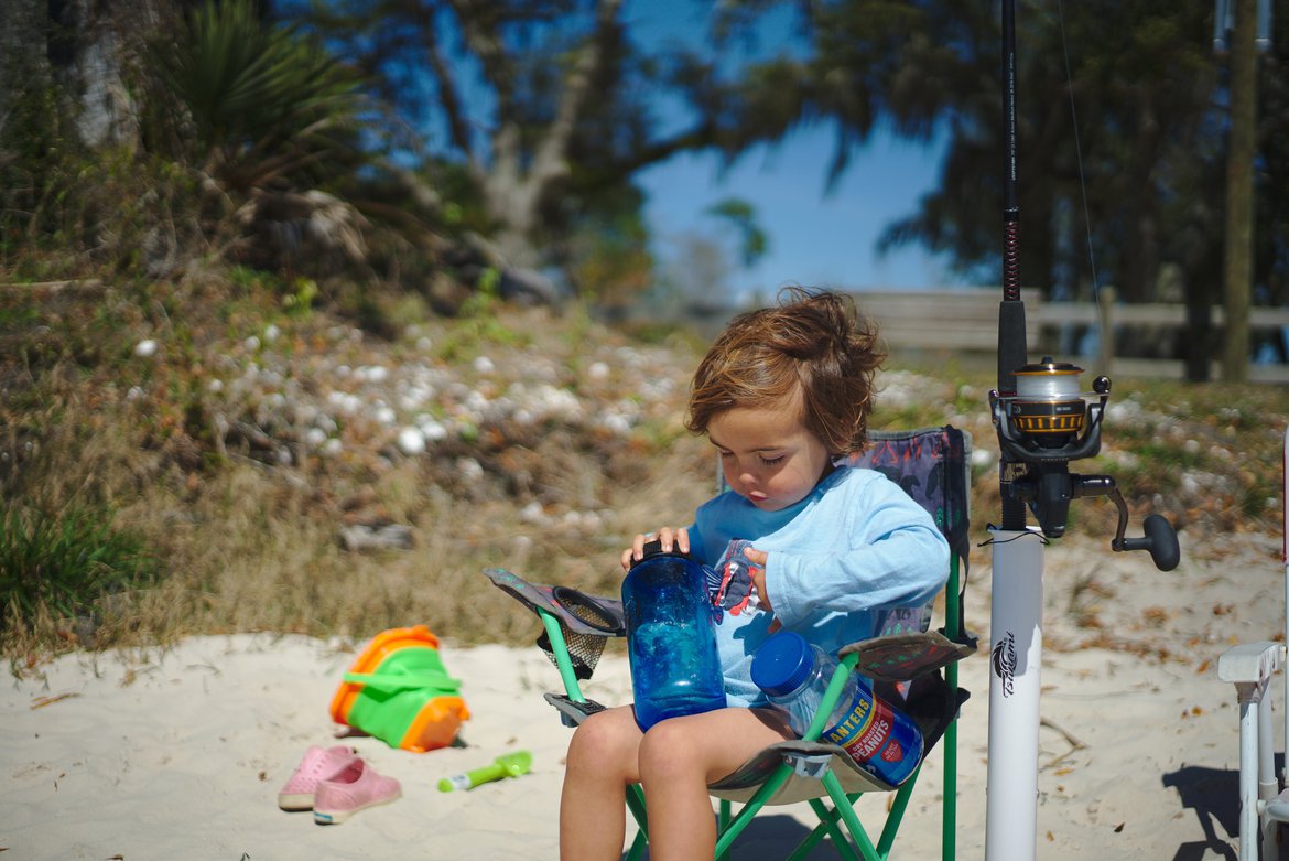 boy fishing east bay, pensacola, FL photographed by luxagraf