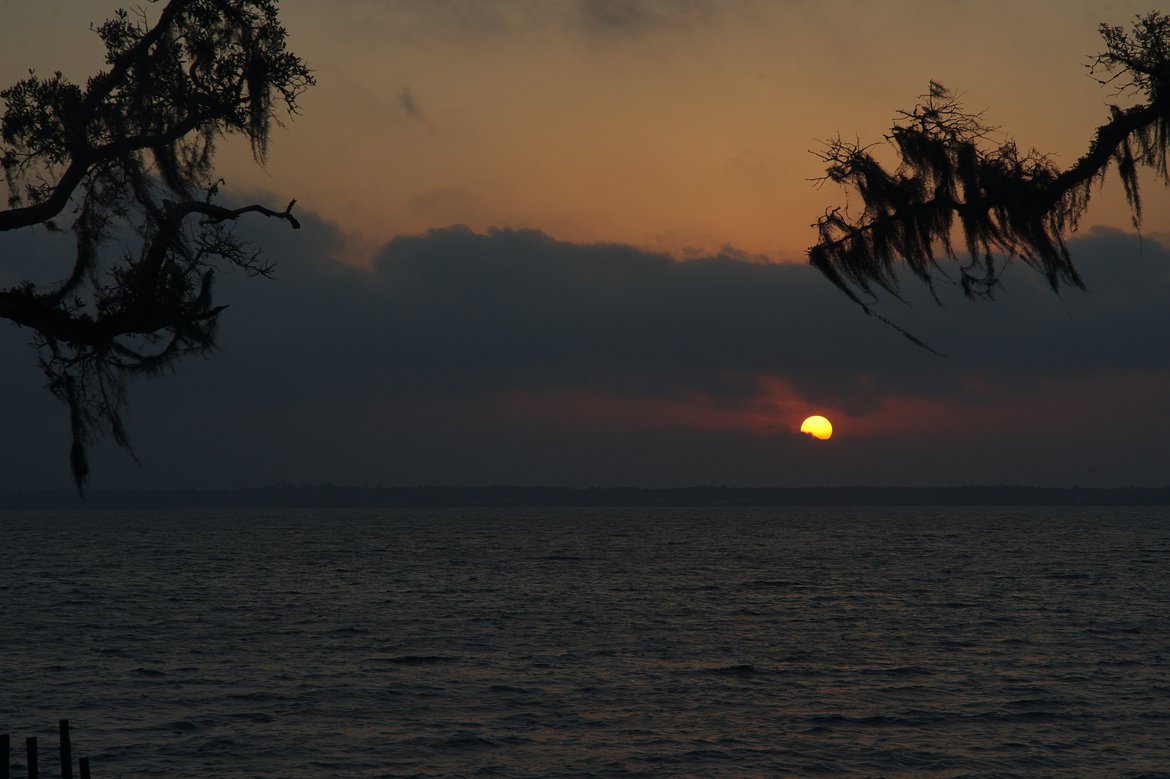 sunset over east bay, Pensacola, FL photographed by Scott Gilbertson