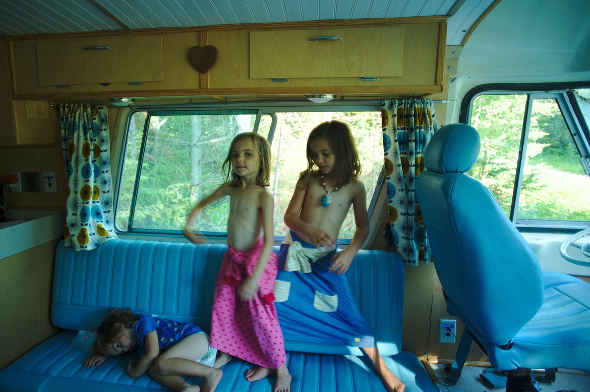 Playing in the bus, Cedar River, MI photographed by luxagraf