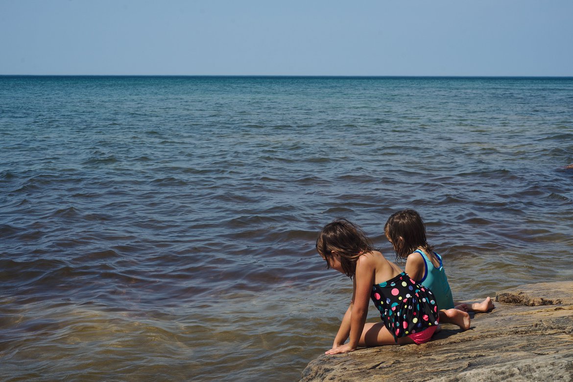 Playing in Lake Superior, Pictured Rocks National Lakeshore, MI photographed by Scott Gilbertson