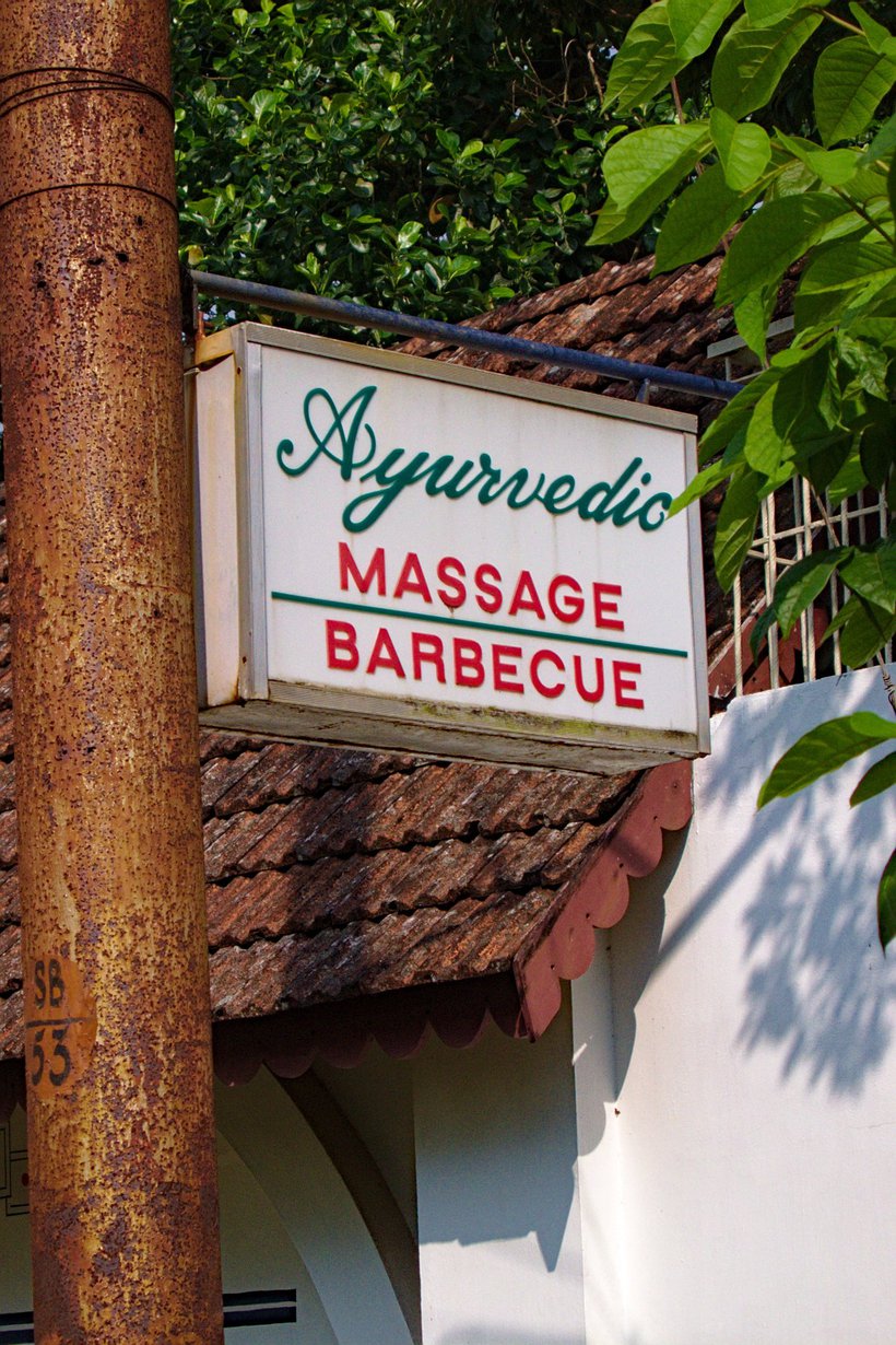Ayurvedic massage, barbecue sign photographed by luxagraf