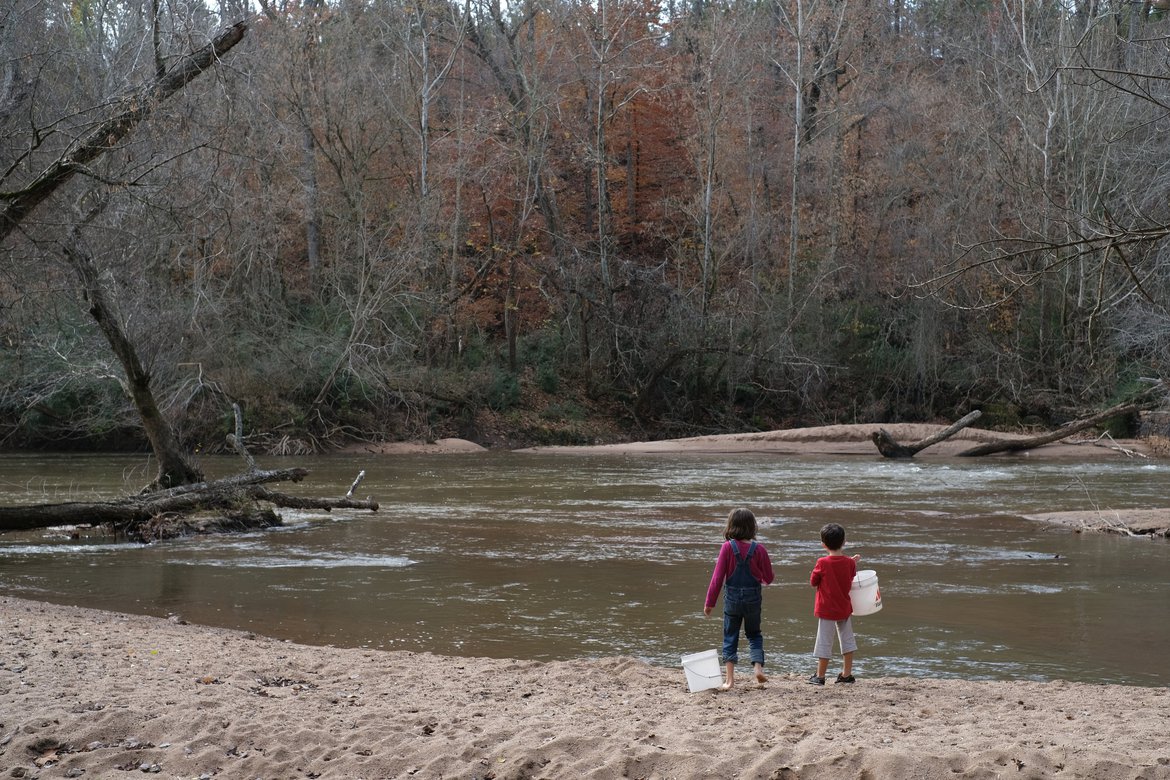 children with buckets by the riverside, athens, ga photographed by luxagraf