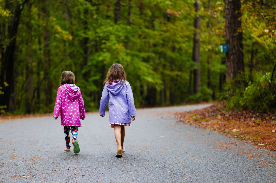 Kids walking down a road in georgia. photographed by Scott Gilbertson