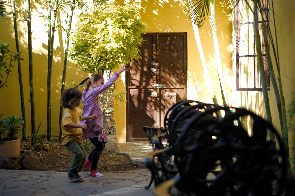 kids playing courtyard of house, san miguel de allende, mexico photographed by luxagraf