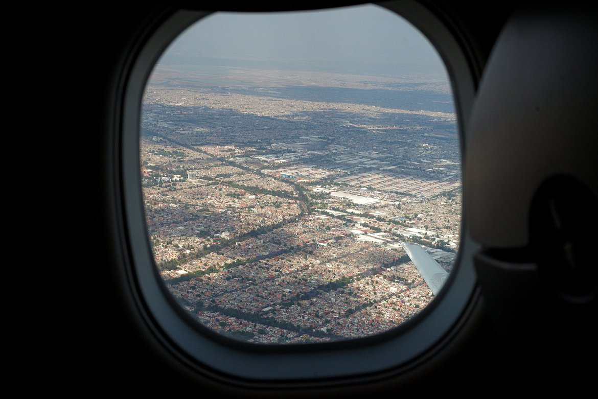 Looking out the window of the plane over mexico city photographed by luxagraf