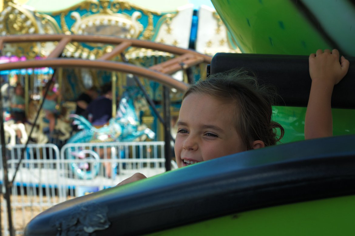 girl on a ride elberton county fair photographed by luxagraf