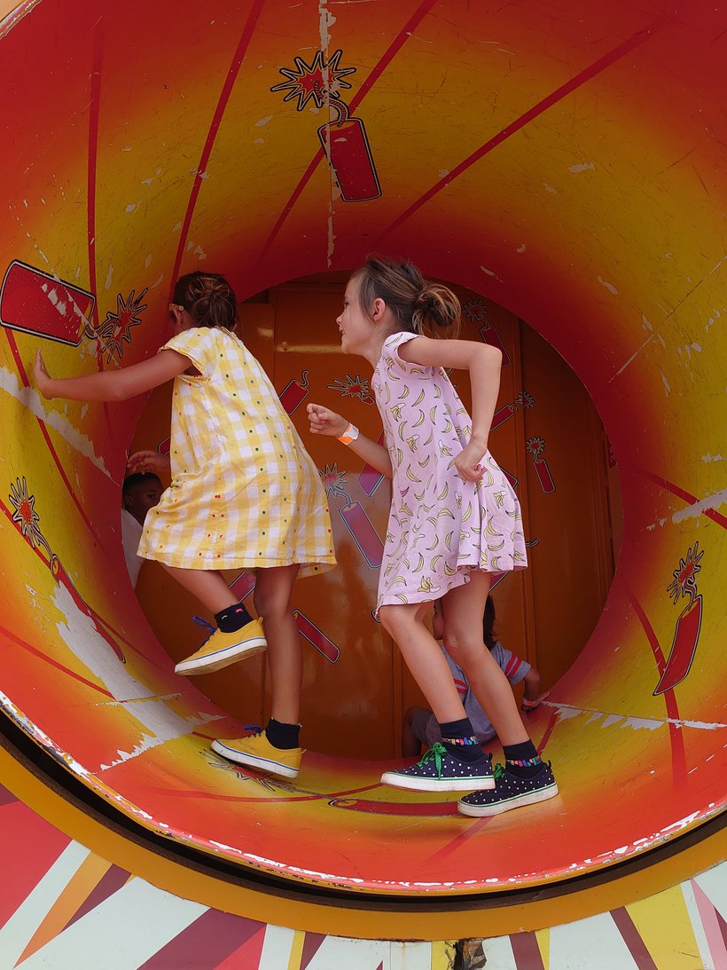 running in a giant barrel at the Elberton County fair photographed by luxagraf