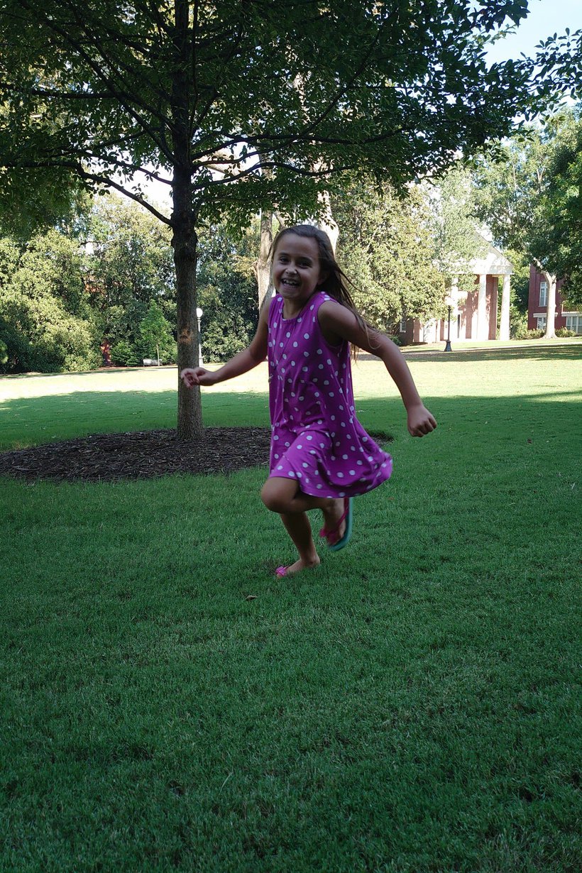 running on the grass, downtown athens, UGA photographed by luxagraf