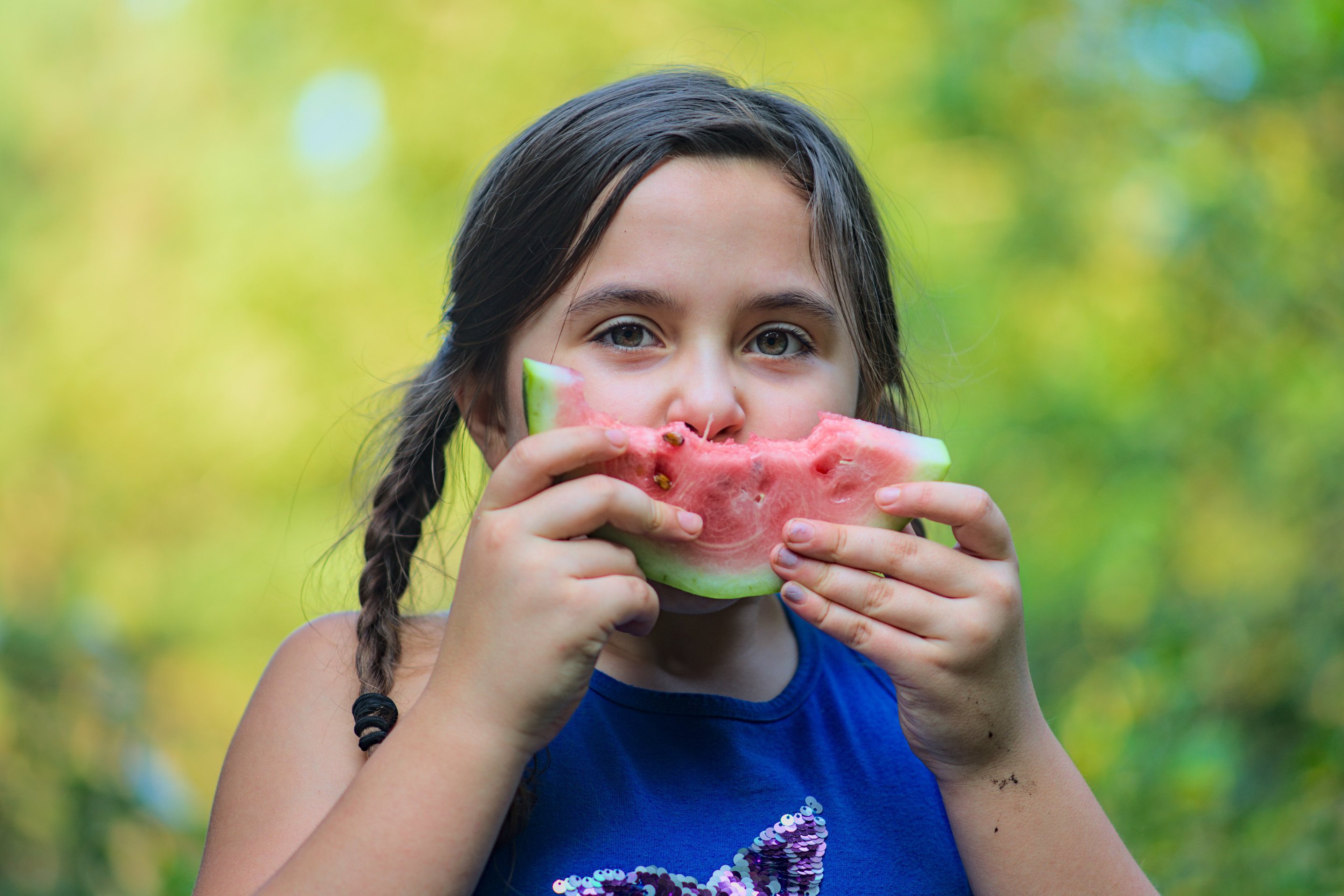 eating watermelon photographed by luxagraf