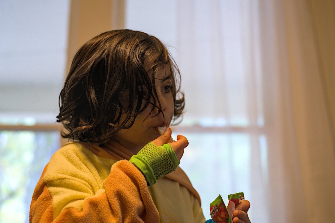 eating fun dip in costume photographed by Scott Gilbertson