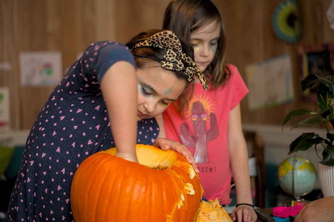 scooping out pumpkin seeds photographed by Scott Gilbertson
