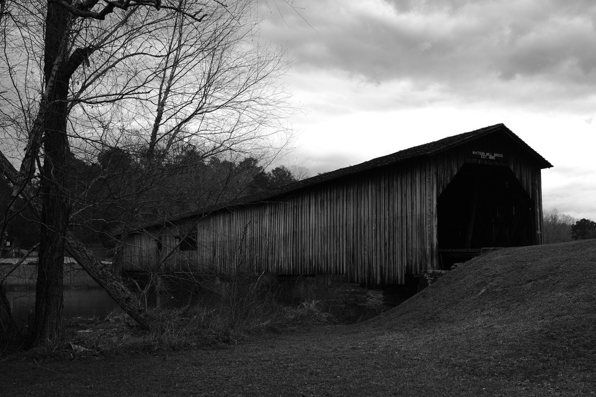 Watson Mill Covered Bridge in black and white photographed by luxagraf