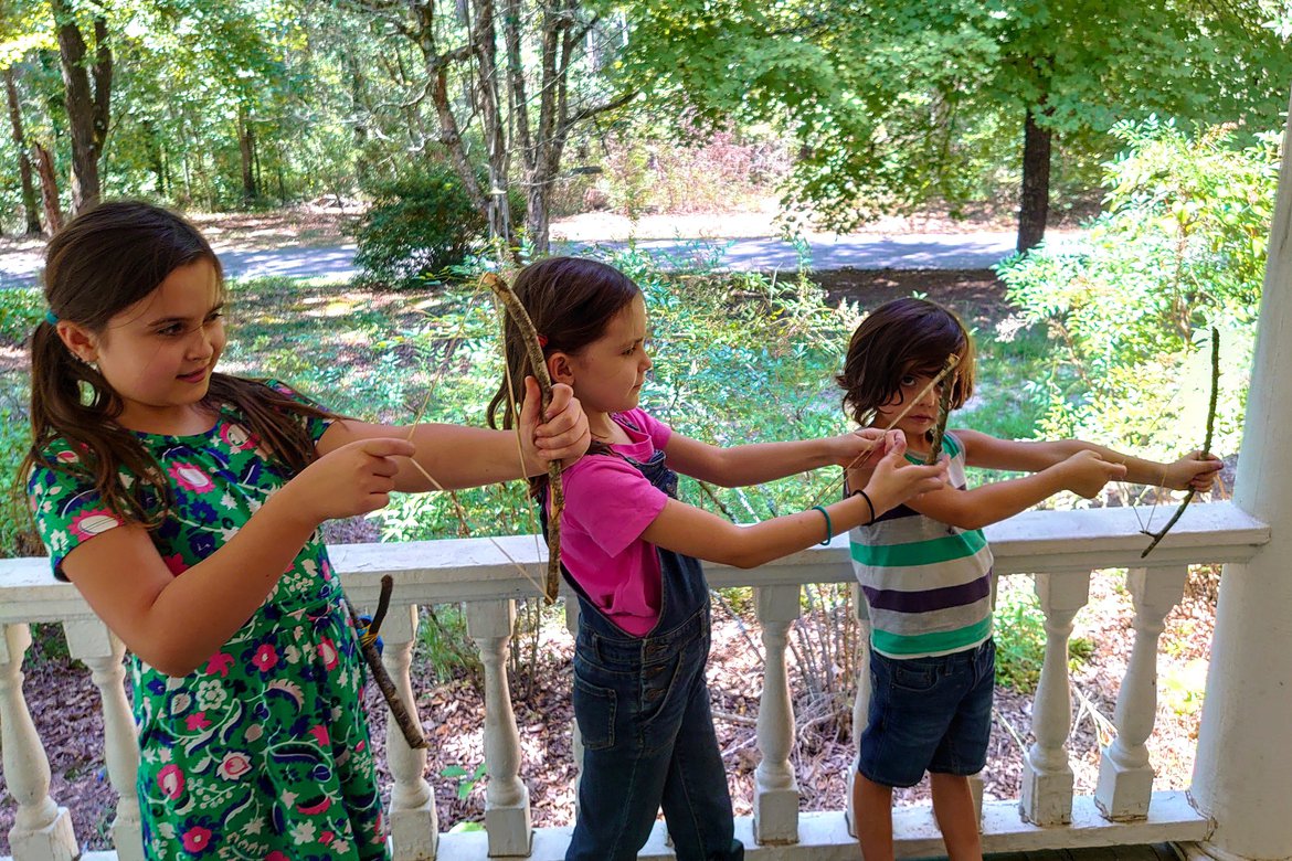 kids with homemade bows and arrows photographed by Scott Gilbertson