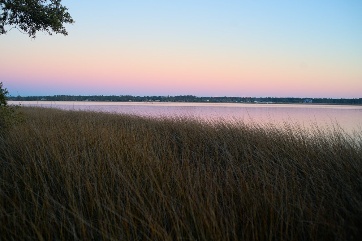 sunset over the bay oyster point, nc photographed by Scott Gilbertson