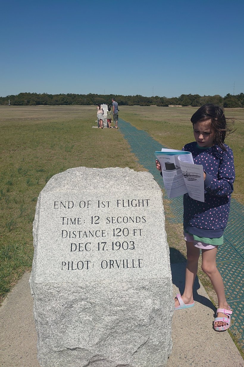 stone marking the end of the first flight, kill devil hills, NC photographed by luxagraf