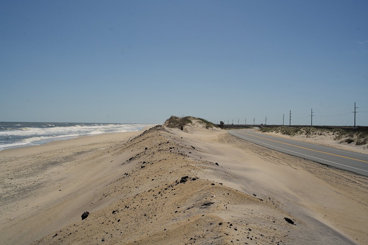 ocean and highway 12 separated by a thin line of dunes, pea island, nc photographed by luxagraf