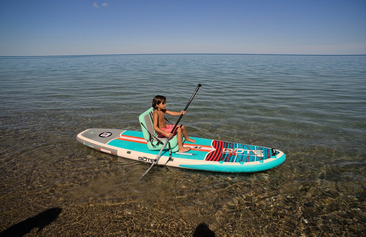 padding the SUP on Lake Michigan photographed by luxagraf