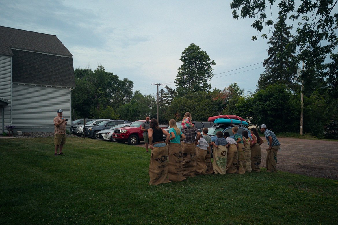 Sack race at midsummer party photographed by luxagraf