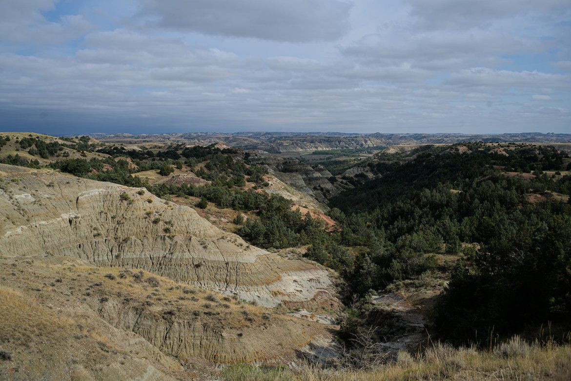 view of the badlands near theodore roosevelt national park photographed by luxagraf