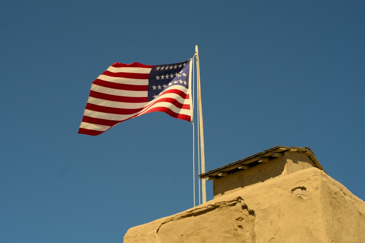 US flag flying above bent's old fort, 1840s, 28 stars photographed by luxagraf