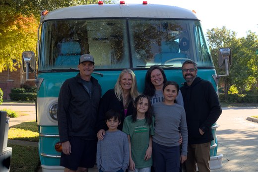 family shot in front of the bus photographed by luxagraf