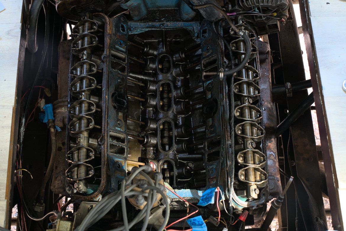 318 LA engine with the valve covers and intake manifold removed photographed by luxagraf