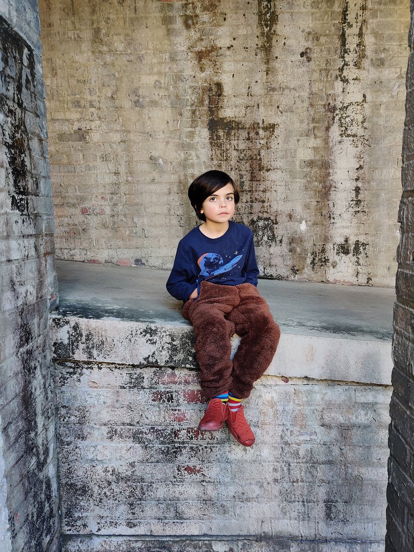 Elliott sitting on a ramp, atalaya, SC photographed by luxagraf