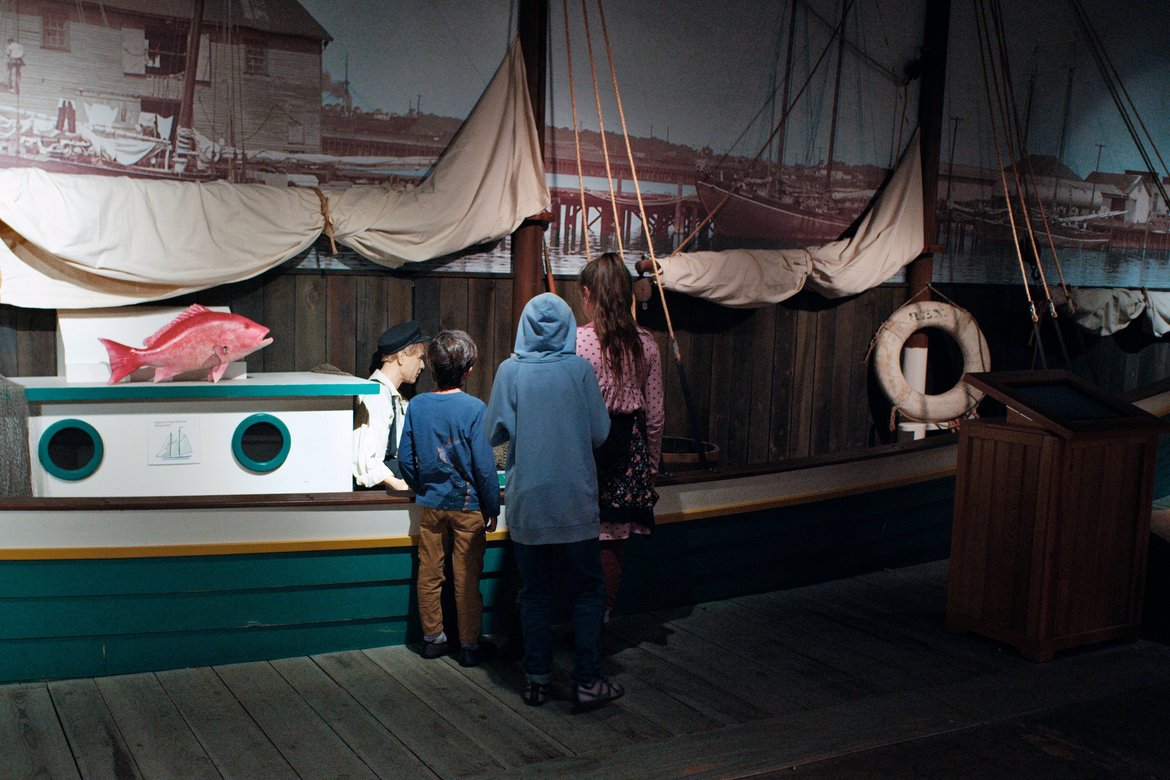 kids at a fishing boat exhibit pensacola historic district photographed by luxagraf