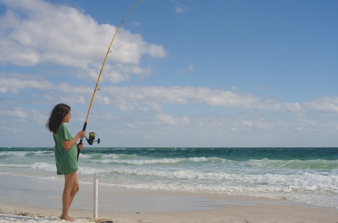 lilah surf fishing at fort pickens photographed by Scott Gilbertson