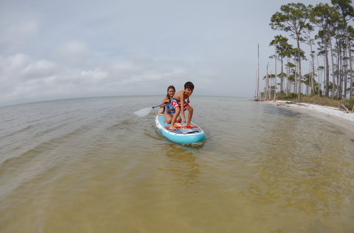paddling boarding on st george sound, florida photographed by luxagraf