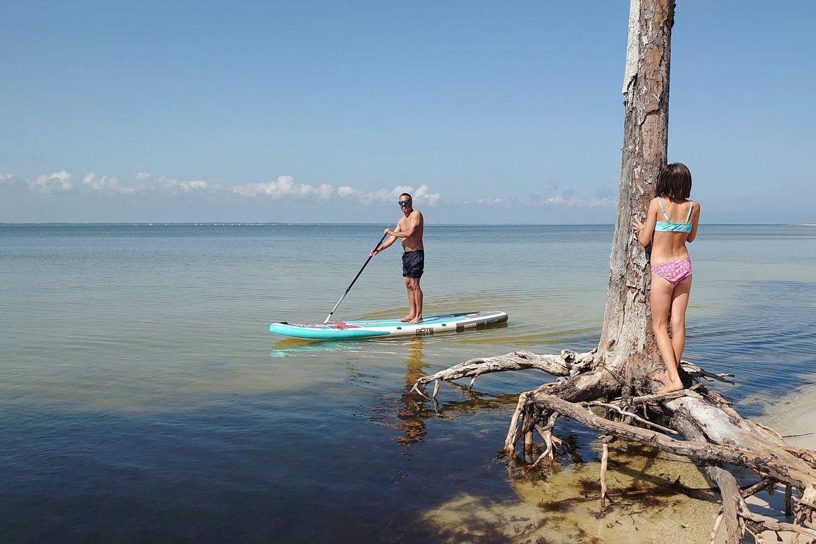 me paddle boarding on st george island photographed by luxagraf