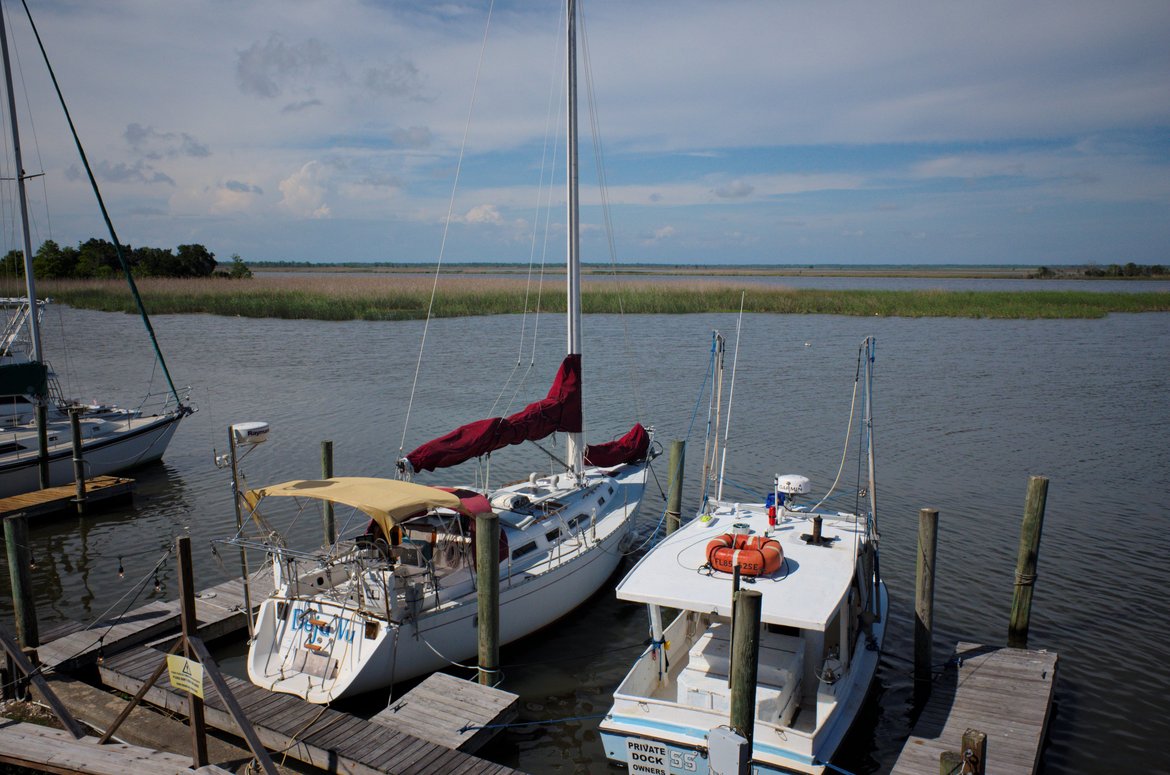boats at the dock below the oyster place in Apalachicola photographed by luxagraf