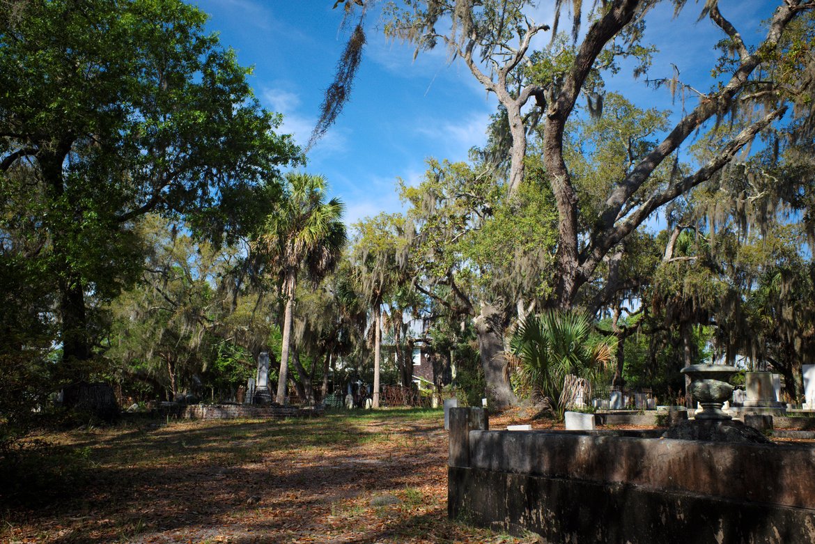 cemetery with huge oak trees and spanish moss, apalachicola, FL photographed by luxagraf