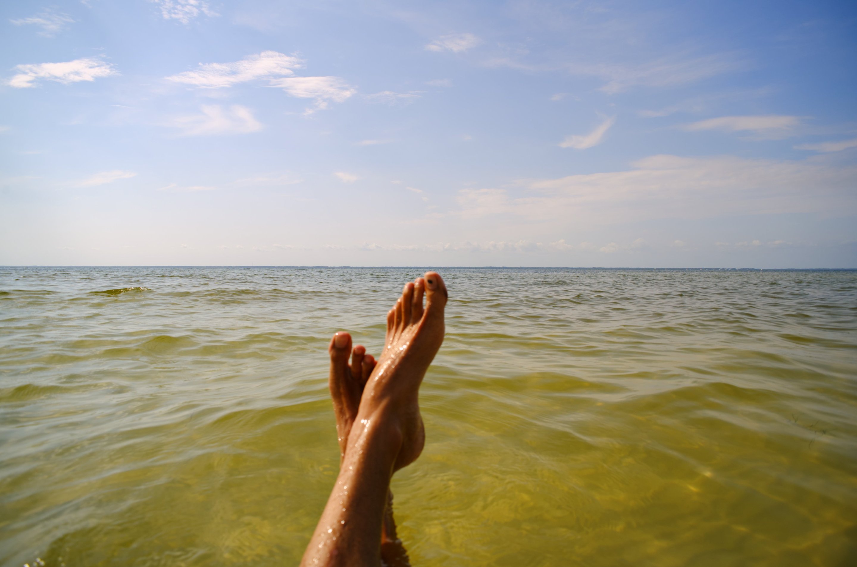 kicking feet up in the bay, St George Island photographed by luxagraf