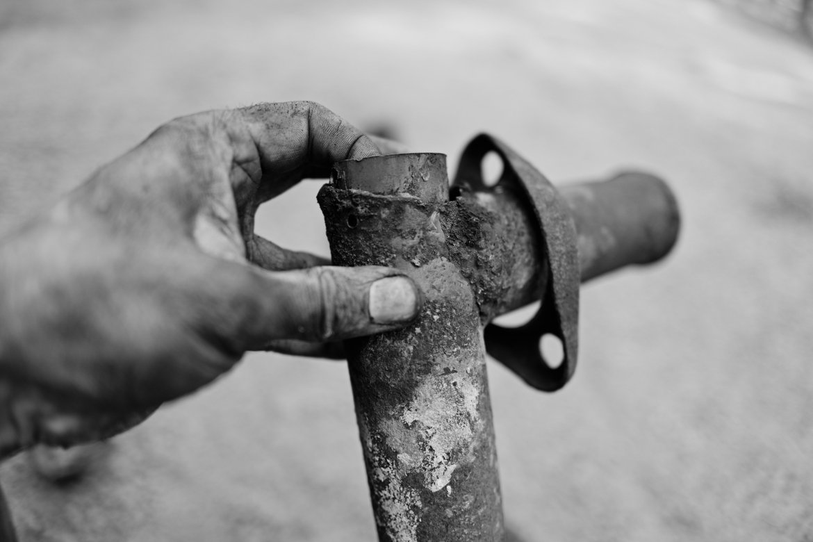 close up of my repair job on our tailpipe photographed by luxagraf