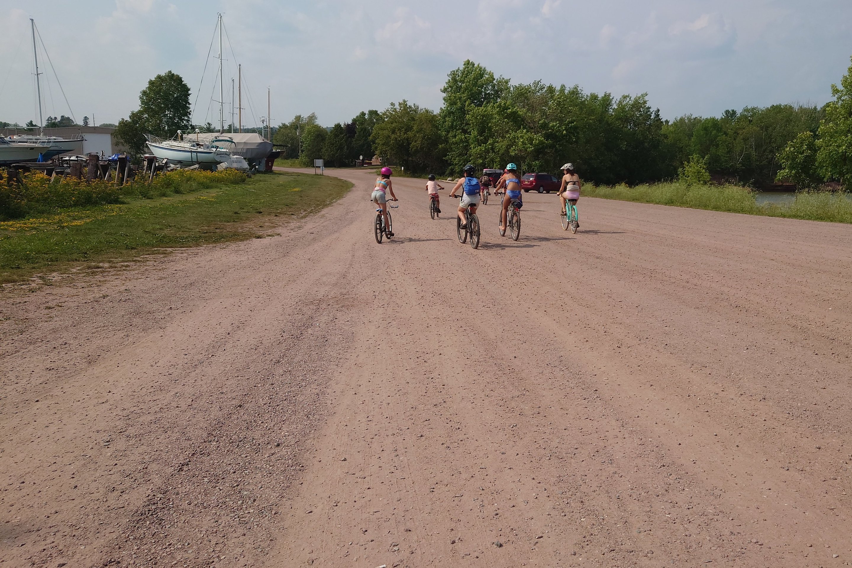 a kid bike gang riding off into washburn photographed by luxagraf