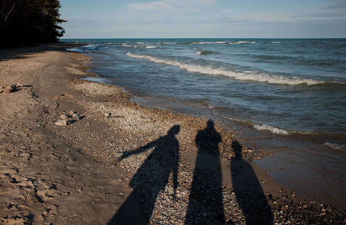 shadow people on the beach, lake huron photographed by luxagraf