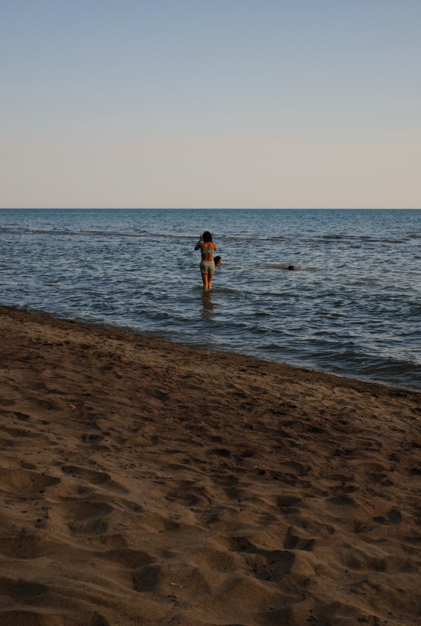 swimming in lake erie, long point provincial park, canada photographed by luxagraf