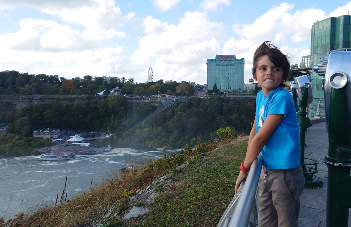 boy with windblown hair at Niagara Falls photographed by luxagraf