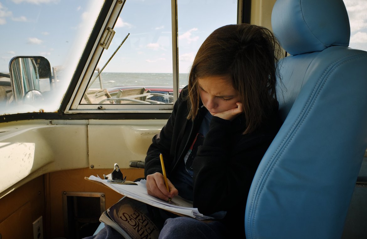 sitting in the bus drawing on the ferry to Delaware photographed by luxagraf