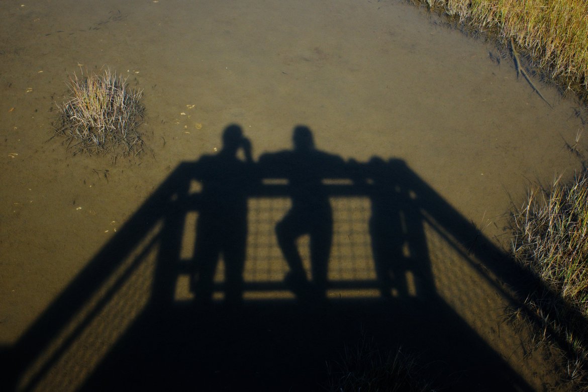 shadow self portrait on the marsh photographed by luxagraf