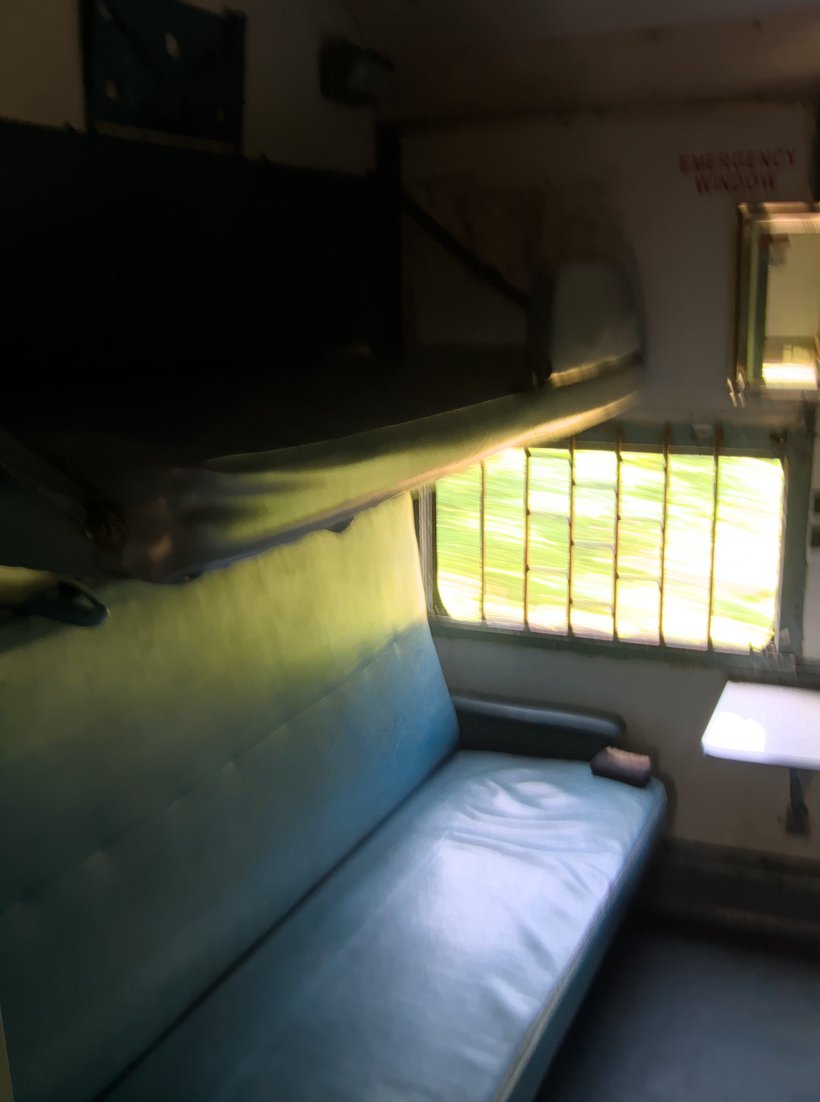 inside of a 3rd class sleeper to goa photographed by luxagraf