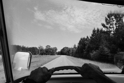 black and white pov shot of driving the bus photographed by luxagraf